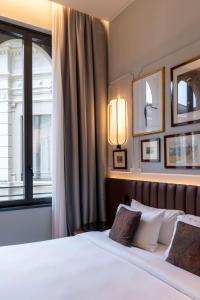 Postel nebo postele na pokoji v ubytování Radisson Collection Hotel, Palazzo Touring Club Milan
