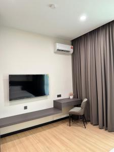 TV a/nebo společenská místnost v ubytování Wendu Inn Hotel