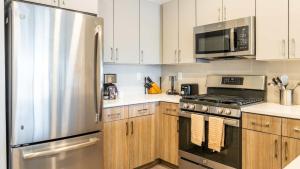 Dapur atau dapur kecil di Luxury Apartment Downtown