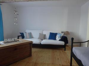 Χώρος καθιστικού στο Modernes und gemütliches Ferienhaus mit Innenhof