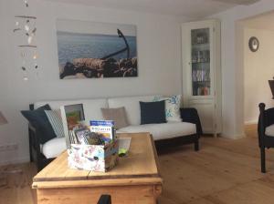 Χώρος καθιστικού στο Modernes und gemütliches Ferienhaus mit Innenhof