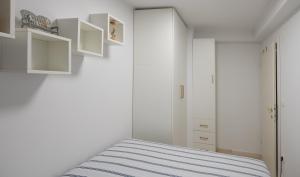 Postel nebo postele na pokoji v ubytování Studio Apartman Tonka