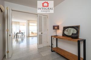 Televízia a/alebo spoločenská miestnosť v ubytovaní Sul Mare Apartament Palamós