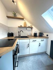 Virtuvė arba virtuvėlė apgyvendinimo įstaigoje Liza’s Home