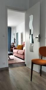 Ein Sitzbereich in der Unterkunft Appartement Pau