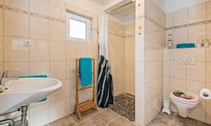 Ein Badezimmer in der Unterkunft Heimathafen
