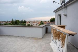 A balcony or terrace at Art Gallery Rimini Apartments 130mq Esclusivo