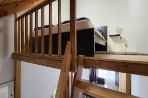 Poschodová posteľ alebo postele v izbe v ubytovaní Ocean Apartment