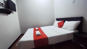 Postel nebo postele na pokoji v ubytování Hotel Rasa Sayang 2