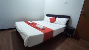 Postel nebo postele na pokoji v ubytování Hotel Rasa Sayang 2