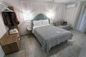 Posteľ alebo postele v izbe v ubytovaní Paradise Hotel