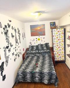 Ένα ή περισσότερα κρεβάτια σε δωμάτιο στο Andu Apartament