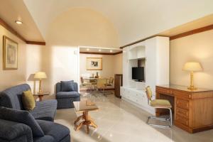 TV a/nebo společenská místnost v ubytování JAZ Pyramids Resort