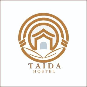 een logo voor een hotel met een spiraal bij Taida Hostel Rincon del Mar in Rincón