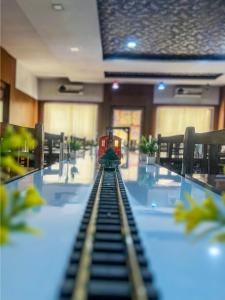 a toy train on a table in a room at Narayans Leela Inn in Udaipur