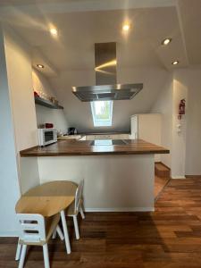 Kuchyň nebo kuchyňský kout v ubytování FeWo Haus Lübeck Sereetz Ostsee