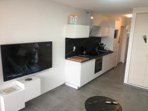 Kuchyň nebo kuchyňský kout v ubytování T2 VUE MER accès plage