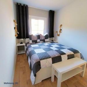 Postel nebo postele na pokoji v ubytování Zeit für Erholung, Ferienhaus A&C Prudlo, Usedom