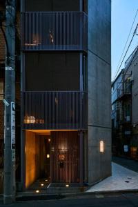 a building with a large door with a balcony at ARCH - Vacation STAY 78045v in Tokyo