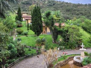 an aerial view of a house with a garden at Pousada Mirante Santo Antônio in Rio Prêto