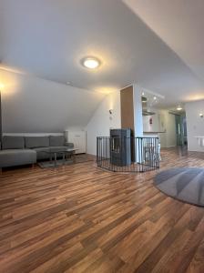 Posezení v ubytování FeWo Haus Lübeck Sereetz Ostsee + 4 fotografie