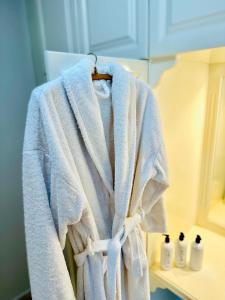 a towel hanging on a rack in a bathroom at The Home by AN in Lapithos