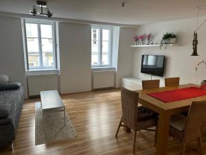 TV a/nebo společenská místnost v ubytování City-Center Apartments