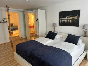 Postel nebo postele na pokoji v ubytování City-Center Apartments