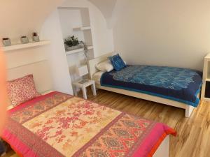 Postel nebo postele na pokoji v ubytování City-Center Apartments