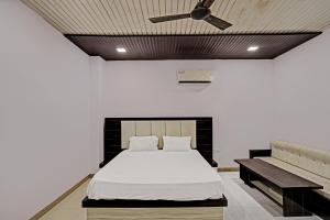 Katil atau katil-katil dalam bilik di OYO 81499 Hotel Love Garden