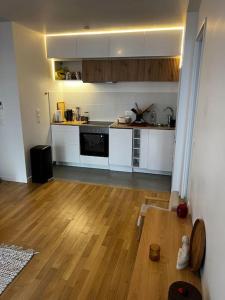 A cozinha ou cozinha compacta de Moderne Cosy Appartement