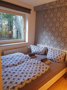 Cama ou camas em um quarto em Einfache Gästewohnung 'nordlicht'