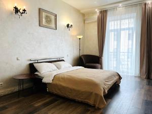 Postel nebo postele na pokoji v ubytování Kyiv Panna Apartment