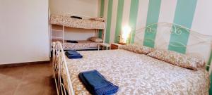 Postel nebo postele na pokoji v ubytování Ai Laghi Bed&Bed + 12 fotografií