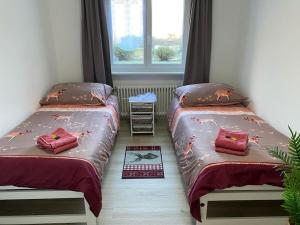 Postel nebo postele na pokoji v ubytování 20 min Lugano - Giardino privato - Sigirino