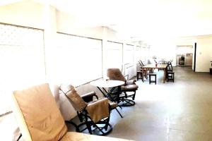 Photo de la galerie de l'établissement 8 Bedroom Subic Bay/300MBPS/Big Screened Lanai, à Sawat