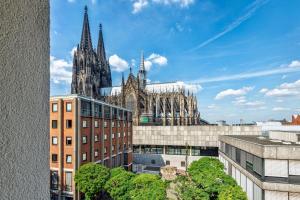 a view of a cathedral from a building at CityClass Hotel am Dom in Cologne