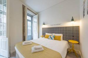 Posteľ alebo postele v izbe v ubytovaní GuestReady - Genuine Oporto Apts - 4