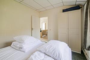 Postel nebo postele na pokoji v ubytování De Duin Haven - Seinpost 03 - Callantsoog