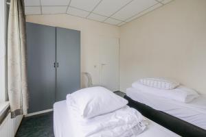 Postel nebo postele na pokoji v ubytování De Duin Haven - Seinpost 03 - Callantsoog