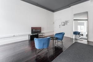 Una televisión o centro de entretenimiento en GuestReady - Innvict Residences