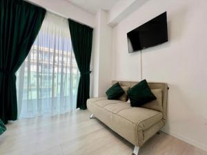 Μια τηλεόραση ή/και κέντρο ψυχαγωγίας στο Luxury Alice studio