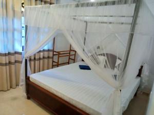 Ένα ή περισσότερα κρεβάτια σε δωμάτιο στο Brave Villa