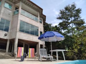 Πισίνα στο ή κοντά στο Casa da pedra