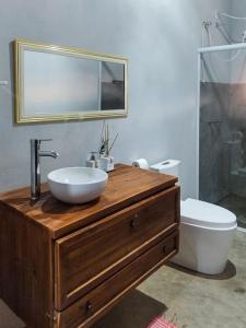 Ett badrum på Sitio Por do Sol - Hospedagem
