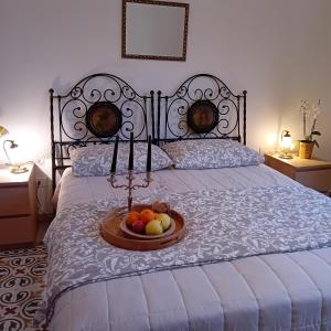 A bed or beds in a room at Happy Holiday
