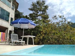 Πισίνα στο ή κοντά στο Casa da pedra