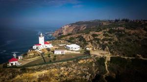 an aerial view of a lighthouse on a mountain at Yadah Guest House in Mossel Bay