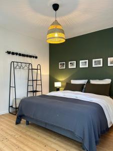 Кровать или кровати в номере La Maison Beaumont - Normandie