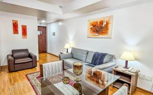 Uma área de estar em Hotel Dan Inn Planalto São Paulo